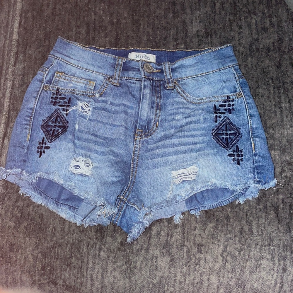 Some shorts a size 3 they’re really cute The brand is mudd